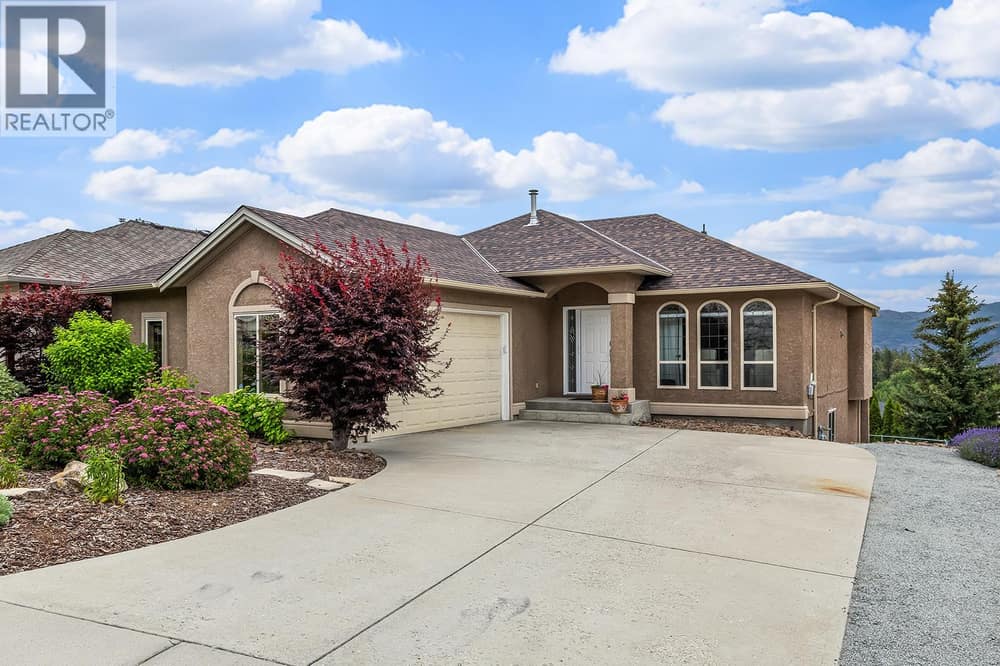 Welcome home to 3069 Bridlehill Drive in Smith Creek, West Kelowna