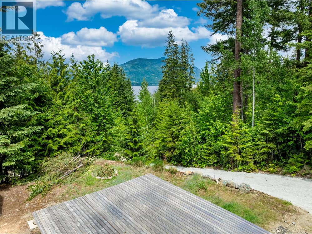 North facing lake and mountain view, view would increase if there was a 2 story home built here.