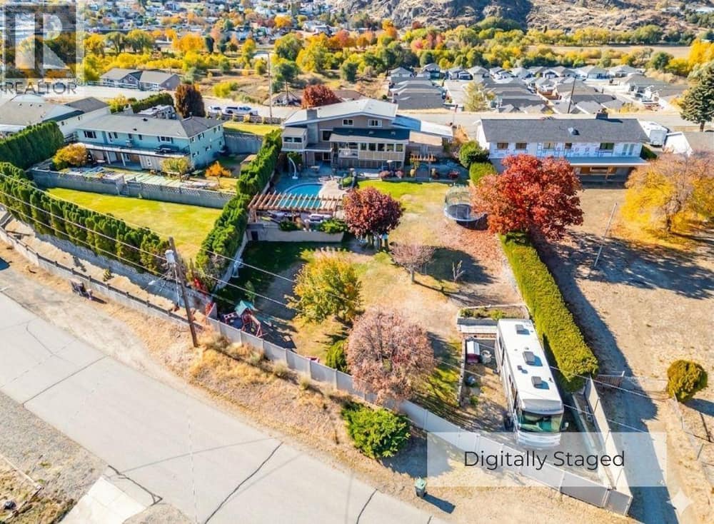 Digitally staged to show RV parking location