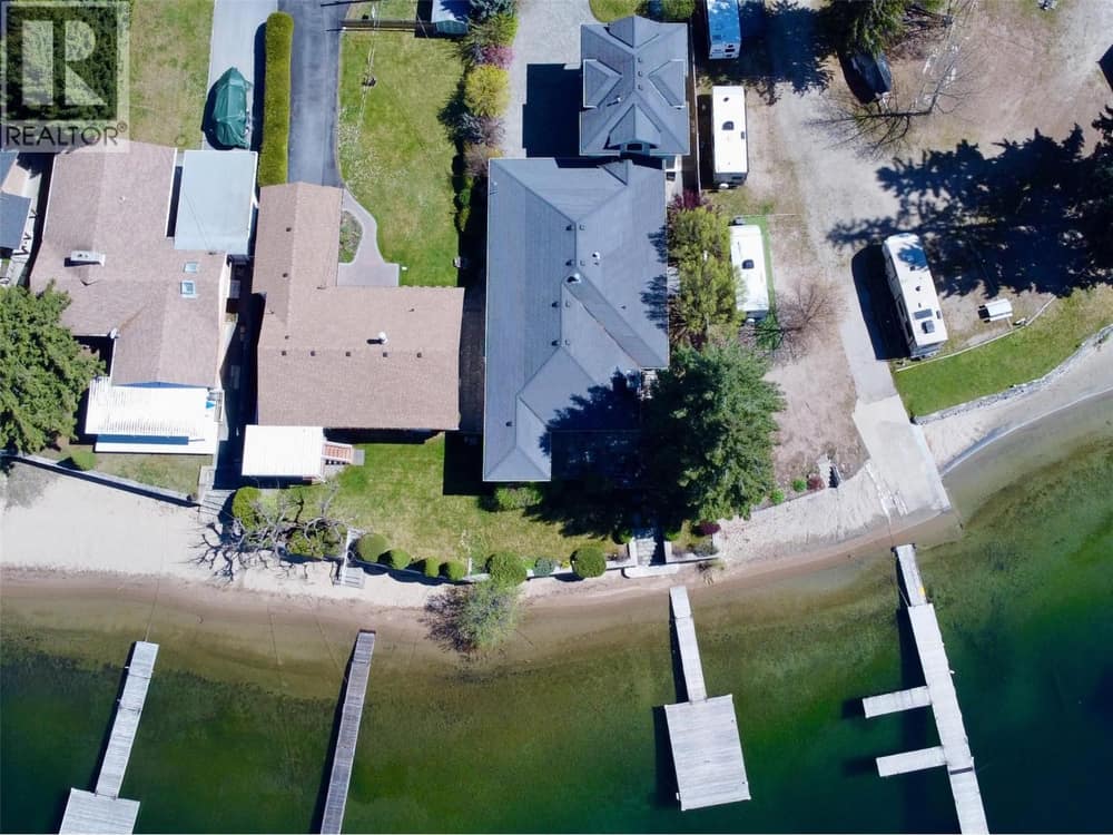 1900+ sq ft lakeside rancher with detached oversized garage and 500 sq ft carriage-style loft