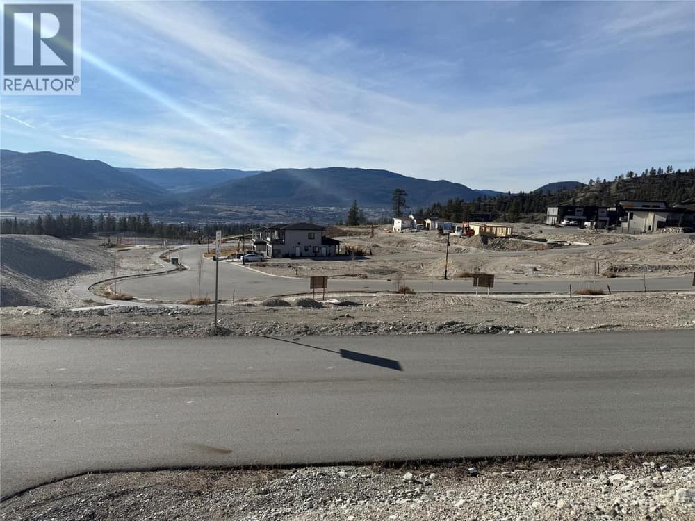 View from lot. Laneway in front.