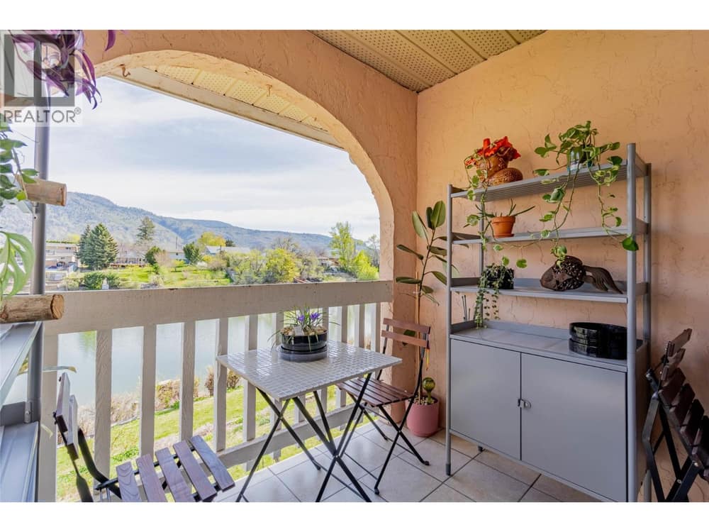 Patio with waterfront view