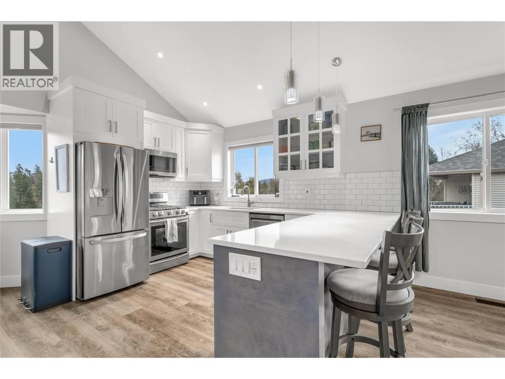 Tons of counter space on these lovely stone tops