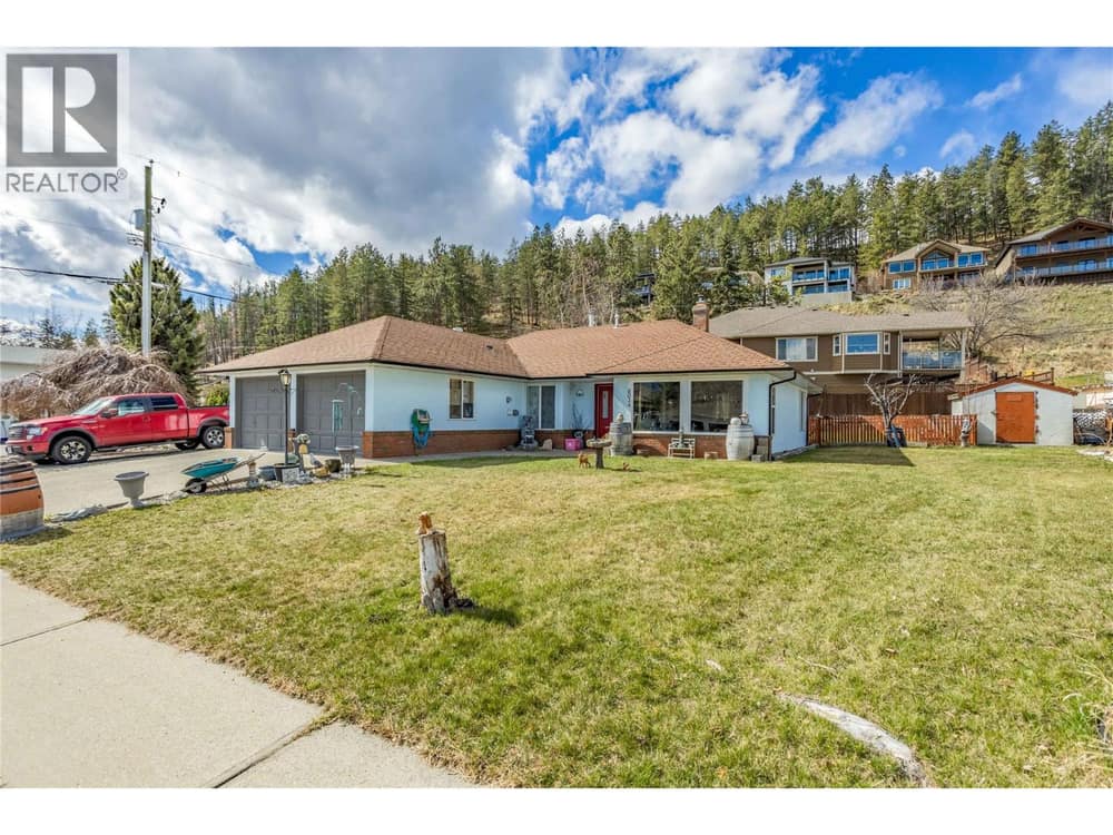 Welcome to this no-stair family home on a huge corner lot