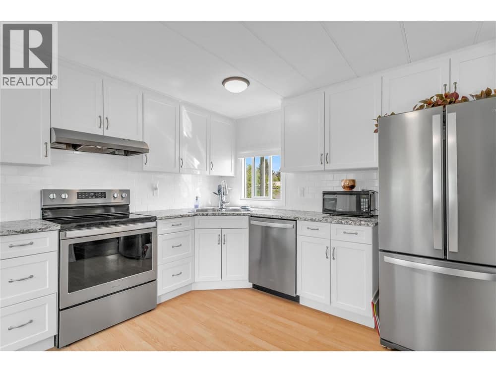 Stainless appliances in the updated kitchen