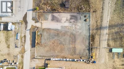 0.99 acre vacant lot zoned for Light Industrial use
