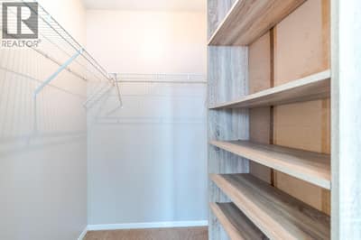 Bedroom with walk in closet
