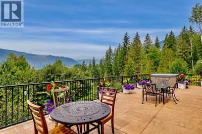 Huge concrete sundeck with mountain and valley views