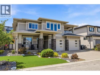 Beautiful curb appeal with fibre cement siding, cultured stone accents and a welcoming front porch/sitting area