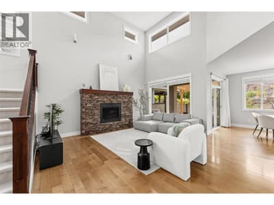 Living room with soaring 18-ft ceilings