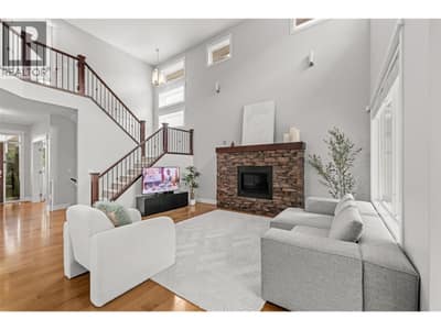 Anchored by a stone gas fireplace