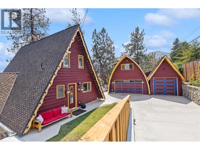 Driveway showing the garage and home.