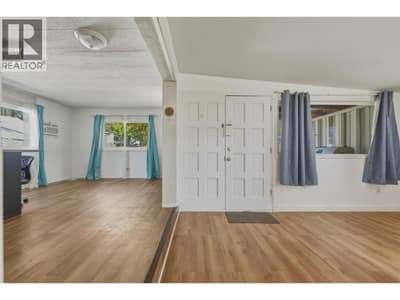 Living Room/Dining area looking towards front door