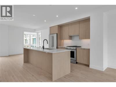 Spacious Kitchen -Photos are of a similar home in the community, in the same colour scheme, some features may vary.