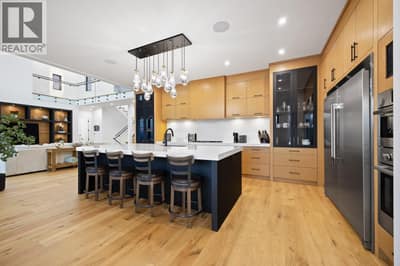 A statement island anchors the kitchen