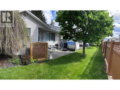 Backyard area has patio