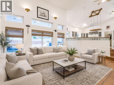 Virtually staged and painted white -Open concept family room and kitchen