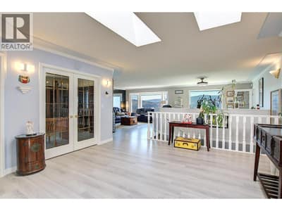 Front foyer to living and dining area