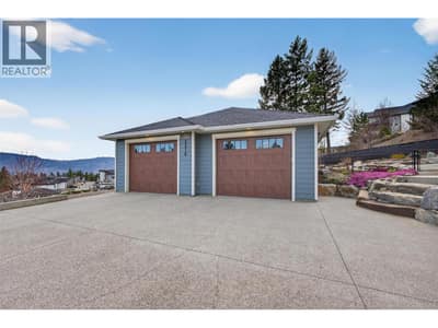 Detached Double Garage & Shop With 220 AMP Service And EV-Ready Wiring