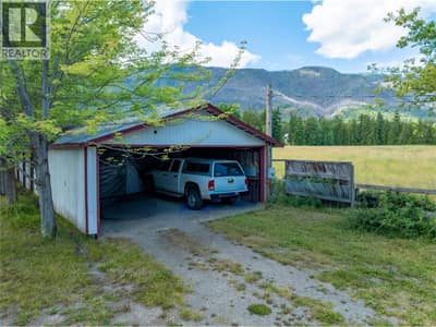 CVRD CARPORT FOR 2 VEHICLES W/3 CAR GARAGE