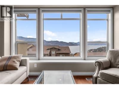 Large windows to showcase the lake and mountain views