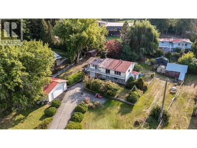 front of house and adjoining house for sale in back.