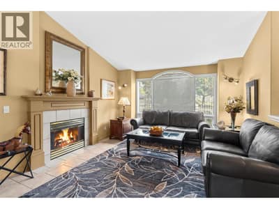 Living room with gas fireplace.