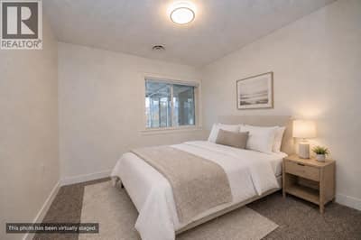Spare Bedroom *This photo has been virtually staged