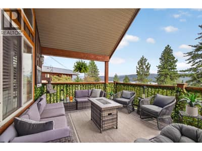 Spacious covered patio with trees amongst you