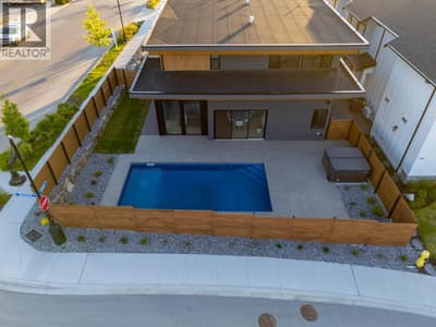 Fully fenced yard with hot tub and pool