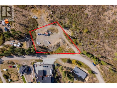.59 Acre lot with over 100 loads of fill added, foundation in, build plans ready, views, and backing onto park land!