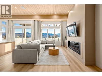 Living Room l Main Level - Bright living space with 11ft ceilings & electric fireplace (#1)