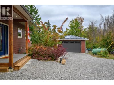 Main entrance and detached garage