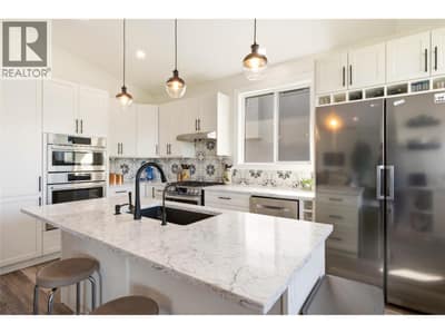 Entertainer’s Kitchen with Commercial-Style Fridge, Wall Oven & Gas Range