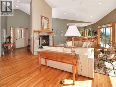 Oak flooring throughout the main floor living room