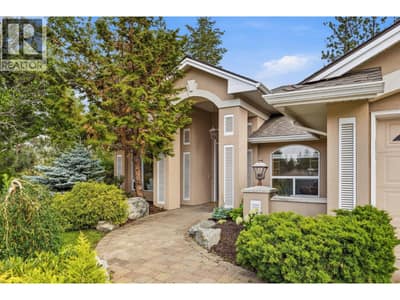 Gorgeous curb appeal with well maintained landscaping