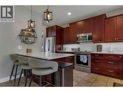 UPDATED quarts countertops and tile backsplash