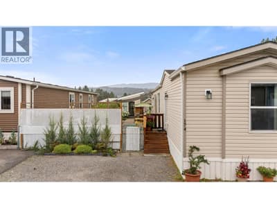Private, gated access leads into the fully fenced outdoor space.