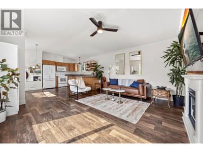 Bright, spacious living with an open connection to the kitchen and dining area.