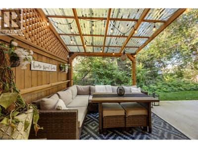 Outdoor covered patio backing onto greenery and a bird sanctuary. Private and quiet.