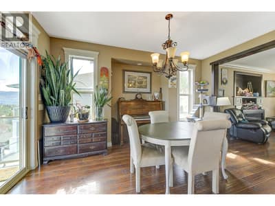 Dining room with sliding doors out to covered sun deck.