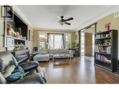 Living room. You'll love the beautiful flooring and the hign end finishing in this home.