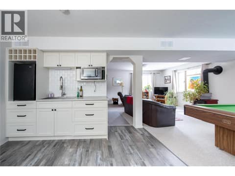Daylight suite kitchen just needs a stove, there's 220 power in place, just needs to be wired in. at 9292 Kokanee Road, Okanagan Landing, Vernon