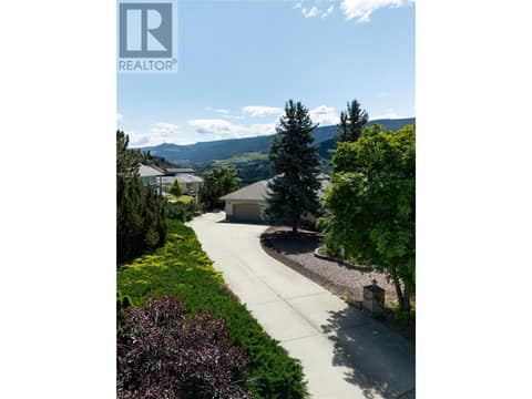 Long tucked in driveway at 8827 Michael Drive, Middleton Mountain Coldstream