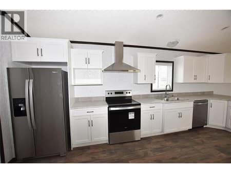 Bright while kitchen at 61 Antoine Road Unit# 24, Swan Lake West, Vernon