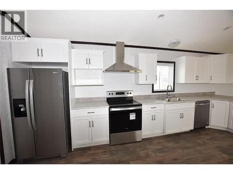 Bright while kitchen at 61 Antoine Road Unit# 24, Swan Lake West, Vernon