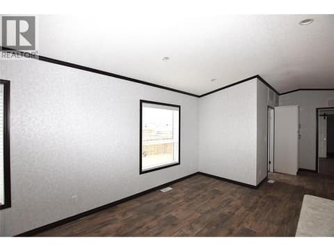 Dining space beside the kitchen at 61 Antoine Road Unit# 24, Swan Lake West, Vernon