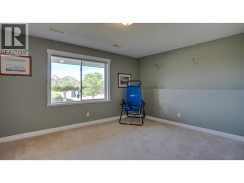 Lower level bedroom for guests at 667 Mt York Drive, Middleton Mountain Coldstream