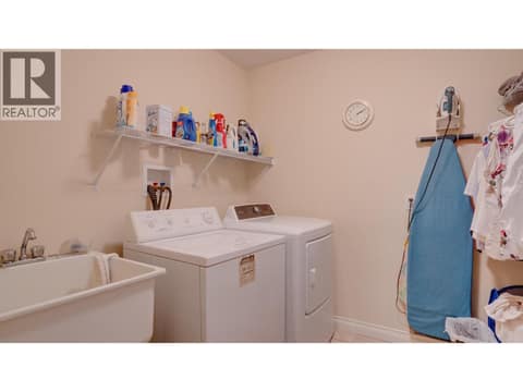 Lower level laundry with tub at 667 Mt York Drive, Middleton Mountain Coldstream