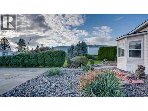 Beautifully done Partial rock-lawn in front of home. at 9510 Highway 97N Unit# 43, Swan Lake West, Vernon